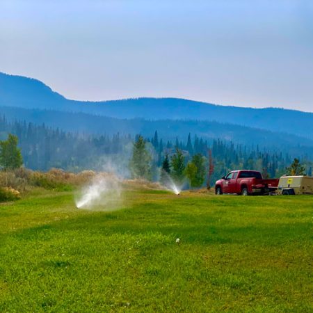 Tough Guys workers doing a sprinkler winter blow-out